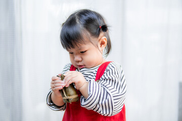 Little girl eating delicious food .happy and enjoyable at the moment.