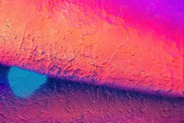 Beautiful bright colorful street art graffiti background. Abstract creative spray drawing fashion colors on the walls of the city. Urban Culture gradient texture, copyspace backdrop