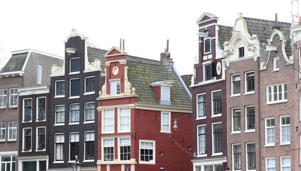 Fototapeta premium Amsterdam Singel Canal House Facades in Various Shades of Brown, Netherlands