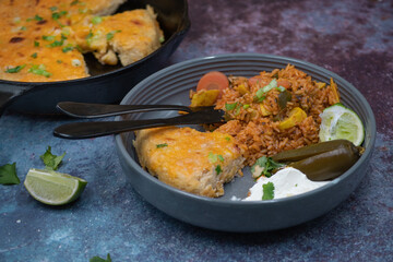 Vegetarian Mexican rice, skillet corn cake, cream, pickles