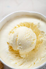 Close up of one ice cream scoop gelato in paper box