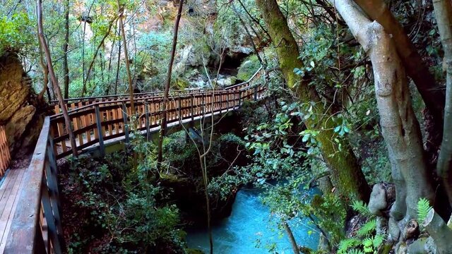 crystal clear stream running through a pristine valley in the town of Pioraco in the Marche region, Italy