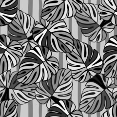 Monochrome jungle seamless pattern. Exotic plant. Tropical palm leaves floral background.