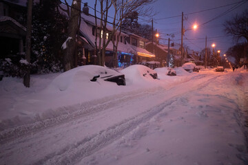 Toronto, Ontario / Canada - January 17, 2022 - Toronto St Clair West neighbourhood during bluehour on day of snowstorm