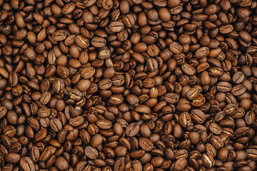 Top view of roasted coffee beans. Freshly roasted coffee, background image.