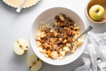 Cooking homemade apple tart or pie with fresh apples, top view. Step by step recipe
