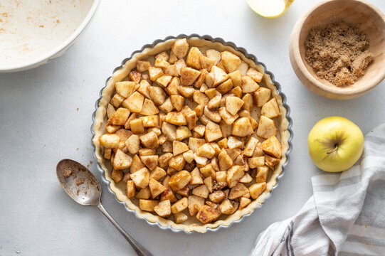 Cooking homemade apple tart or pie with fresh apples, top view. Step by step recipe