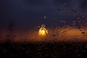 Raindrops on the background of sunset. Abstract natural background. - 482201442