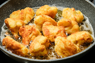Frying breaded cauliflower