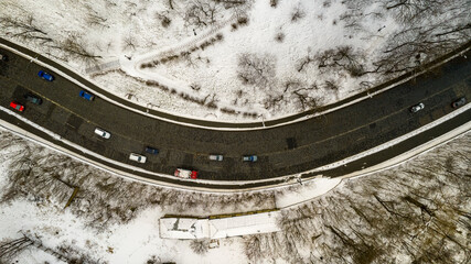 Aerial view of the road with cars in winter