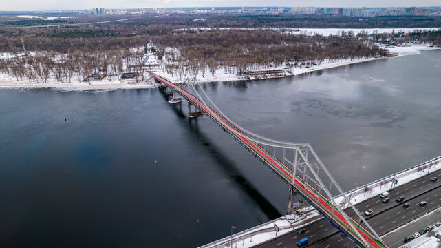 Aerial view of footbridge in winter