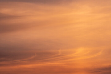 Whisps Of Orange and Purple Clouds Above Glacier