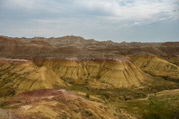Fototapeta na wymiar Yellow and Red Formations In Badlands