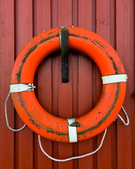 life buoy on wooden wall