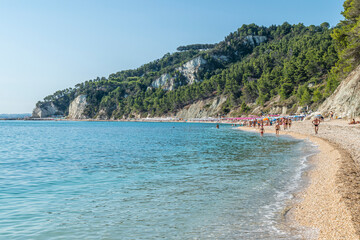 The beautiful beach of San Michele in Sirolo with blue water