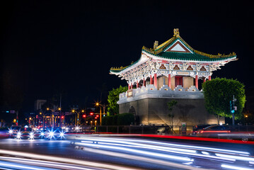 View traffic cars with light long exposure photo with east gate Taipei monument