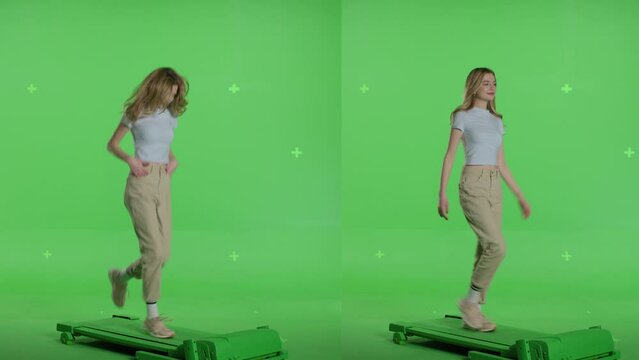 Casual young blonde woman walking. Shot on a mock-up green screen in the background. 4k uhd video on Chroma key