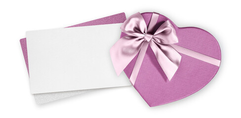 Mothers day gift card, heart shape box with pink shiny ribbon bow and blank white ticket with copy space isolated on white background, top view and also for women's day or greetings card