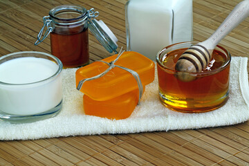 Honey soap with me and honey on a towel.