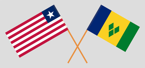 Crossed flags of Liberia and Saint Vincent and the Grenadines. Official colors. Correct proportion
