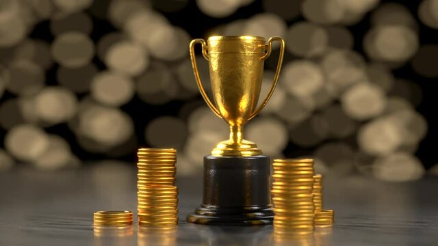 Prize, reward with coins on the table. Blurred background with bokeh lights. The concept of a prize, awards.