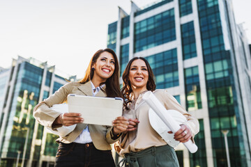 Fototapeta premium Portrait Of A Two Female Real Estate Agent Outside An Office