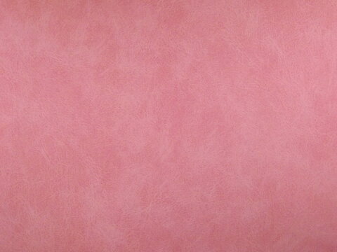 Pink suede surface textured as a background. High quality photo