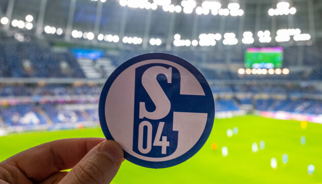 September 12, 2021, Gelsenkirchen, Germany. The emblem of the football club FC Schalke 04 against the background of the modern stadium.