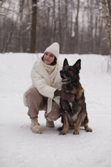 smiling girl hugs her dog