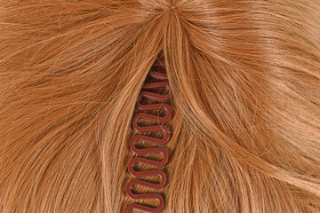 French hair braiding tool on blond hair
