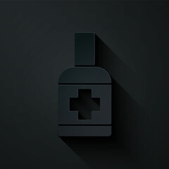 Paper cut Bottle of liquid antibacterial soap with dispenser icon isolated on black background. Antiseptic. Disinfection, hygiene, skin care. Paper art style. Vector.