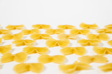 farfalle pasta on white background