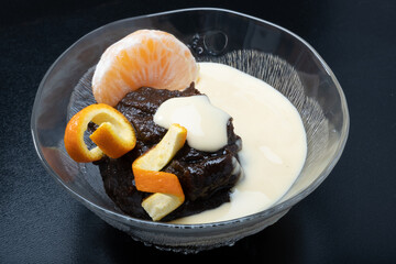 Traditional Finnish cuisine - Typically rye based Mämmi is eaten around Easter with fresh cream or custard.