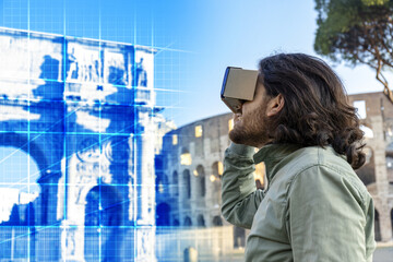 Young man in Piazza del Colosseo (Rome) looks at a virtual reconstruction with a cardboard viewer. The landscape around him changes, taking him on a journey through time and space.