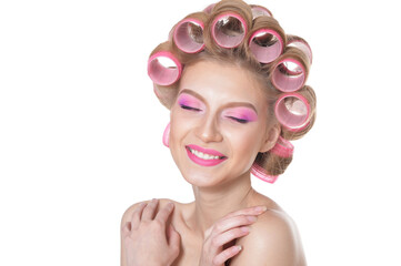 portrait of beautiful woman with hair curlers