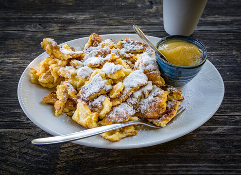 Kaiserschmarrn with apple mash, a sweet and tasty traditional dish of austria, europe.