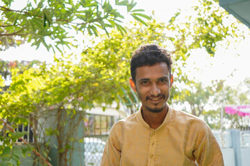 portrait of a indian male wearing traditional dress