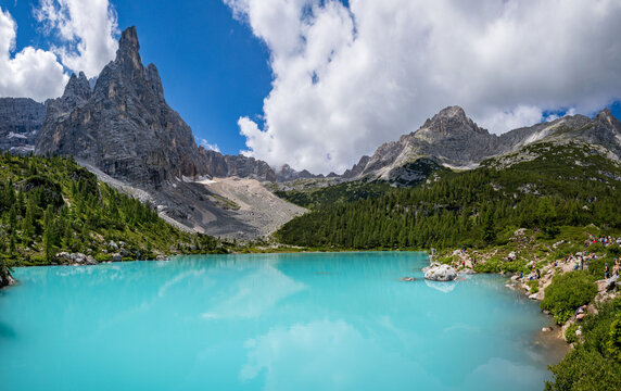 Panorama of Lago di Sorapis, Dolomites, Italy. The bluest mountain lake in the alps.