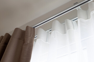 Fototapeta na wymiar Curtains door or window, Curtain rail with white and brown curtain