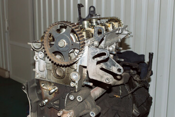 View of the partially disassembled engine from the side of the timing gear