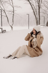 Young Asian woman in winter location with snow
