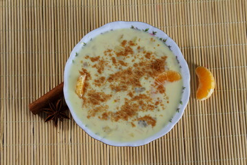 indian style sweet desert custard creamy milk fruit salad with cinnamon natural flavor,top view