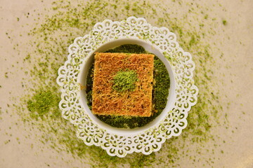 Turkish Dessert Kadayif with pistachio powder. 