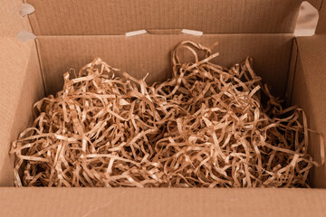 Moving day, box with paper material.Eco material for packaging goods, things, fragile items....