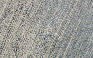 Texture of a snowy winter field. Photo from above