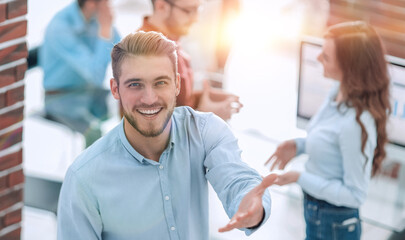 Obraz premium happy young business man portrait in bright modern office indoor