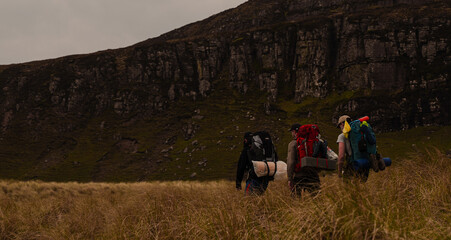 Men Walking in a Mountain Landscape