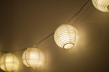 lantern lighting. Atmospheric image in dim lighting. Introduces a romantic or reflective mood.