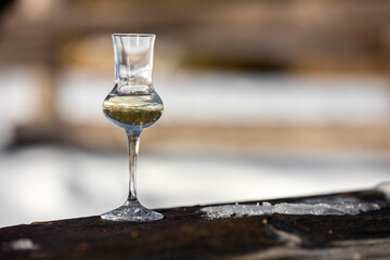 Flavored Grappa (Schnapps) glass in Cortina d'Ampezzo, Dolomites, Italy