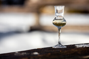Flavored Grappa (Schnapps) glass in Cortina d'Ampezzo, Dolomites, Italy